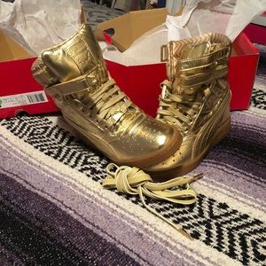 Gold Hi-top wedge Pumas